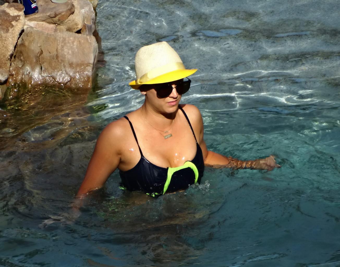 16P Kaley Cuoco busty wearing skimpy twopiece with her husband at the pool in Mexico