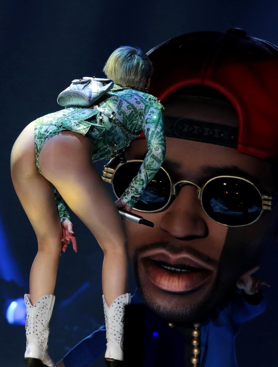 16P Miley Cyrus shows off her ass in money inspired leotard while performing at Bang
