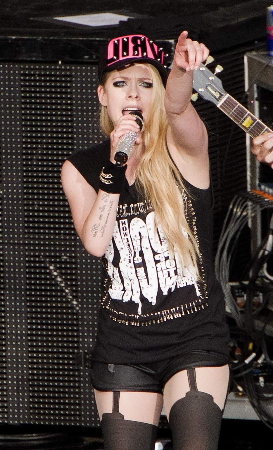 16P Avril Lavigne in shorts and pantyhose performing in Mountain View Canada