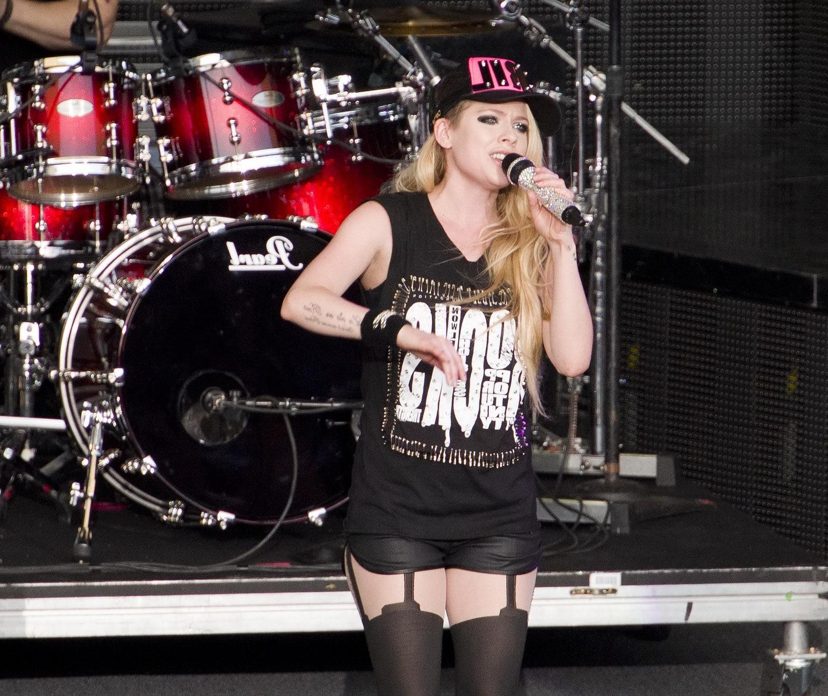 16P Avril Lavigne in shorts and pantyhose performing in Mountain View Canada