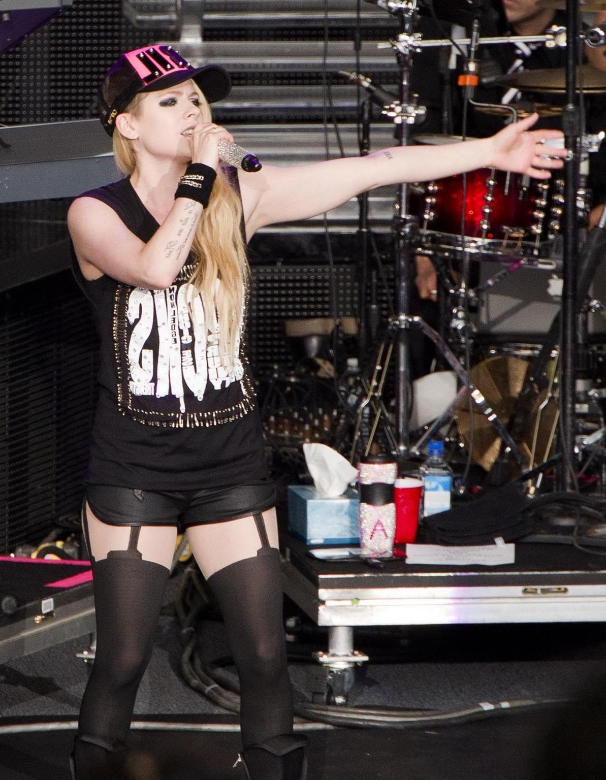 16P Avril Lavigne in shorts and pantyhose performing in Mountain View Canada