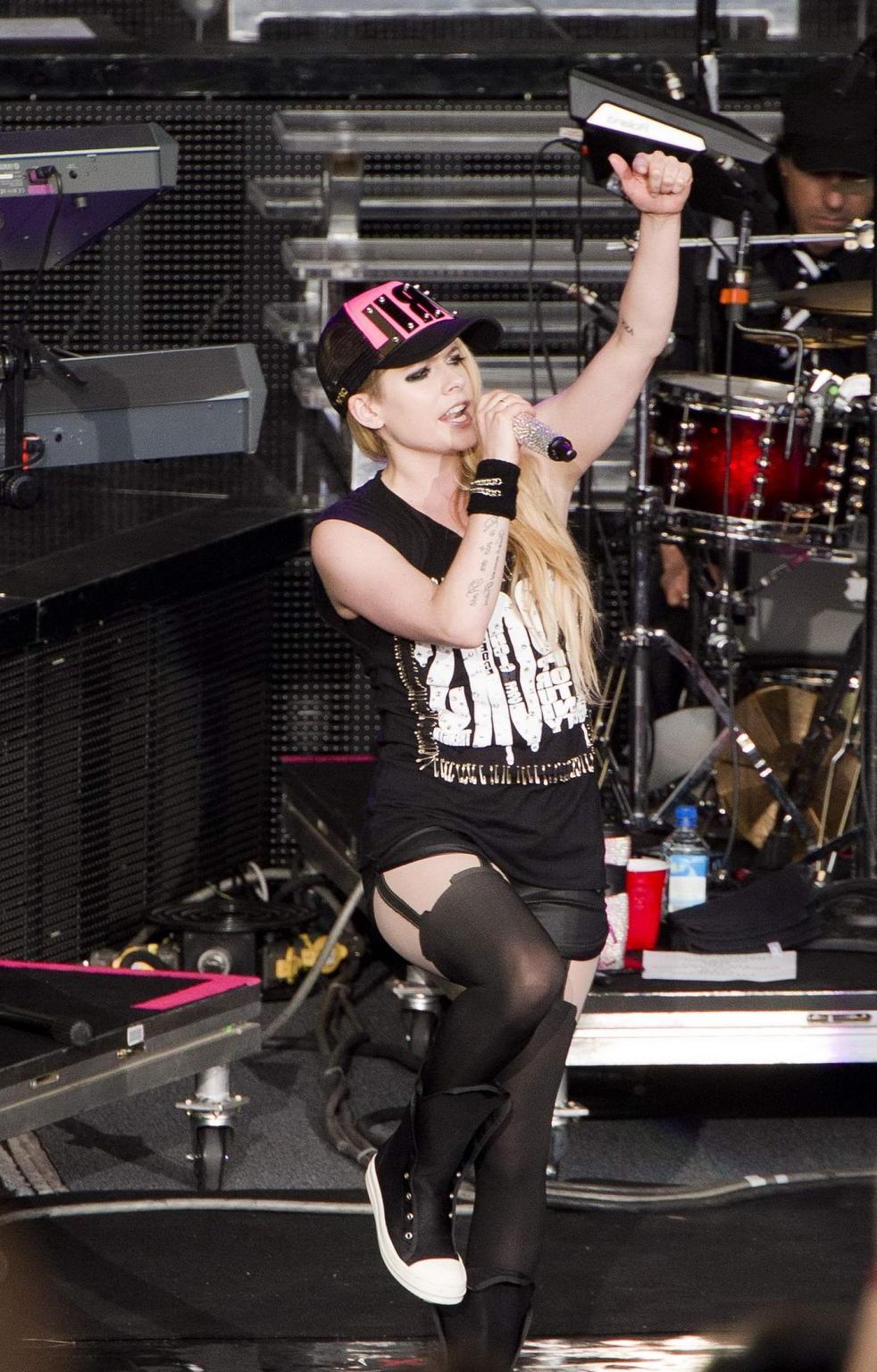 16P Avril Lavigne in shorts and pantyhose performing in Mountain View Canada