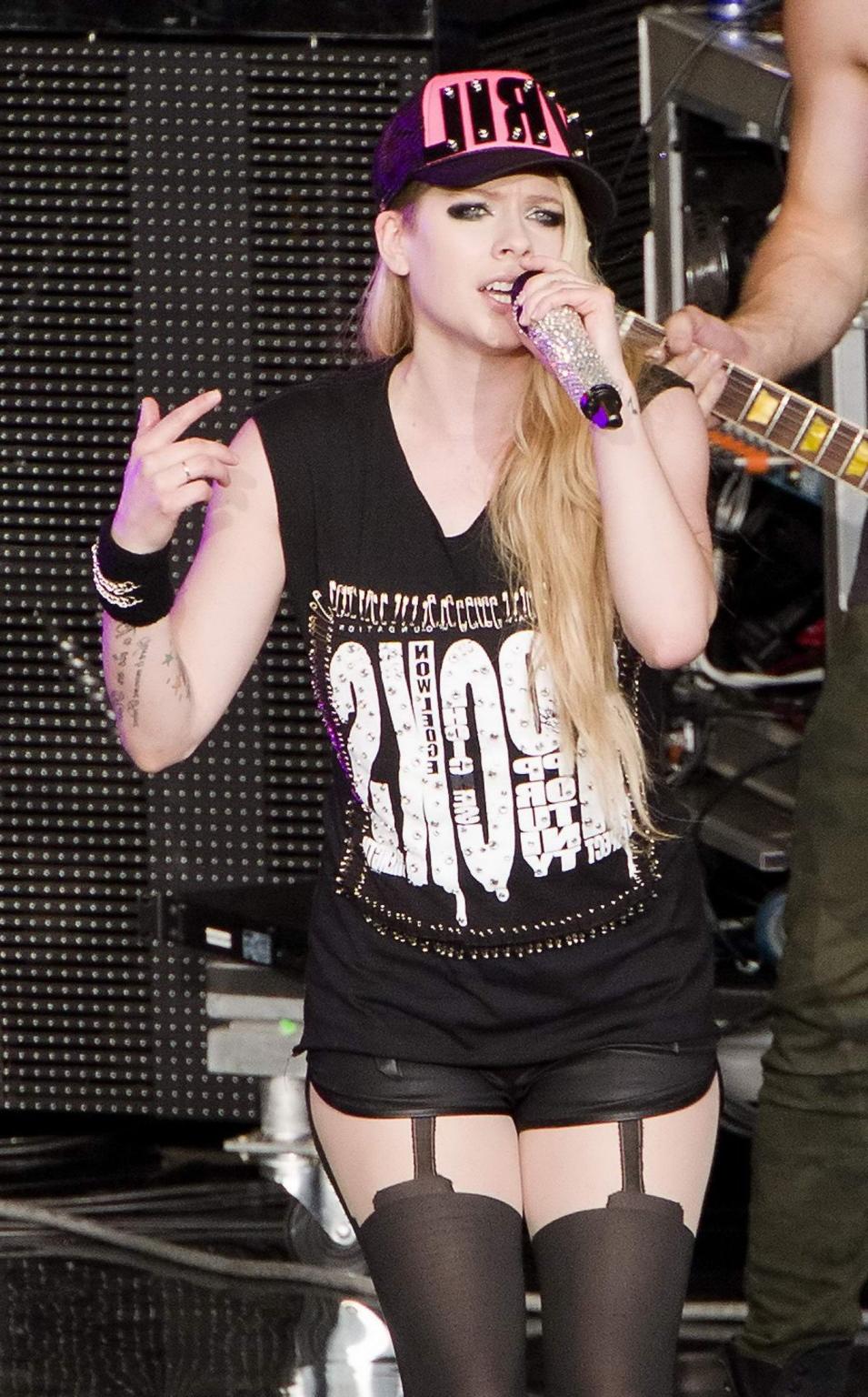 16P Avril Lavigne in shorts and pantyhose performing in Mountain View Canada