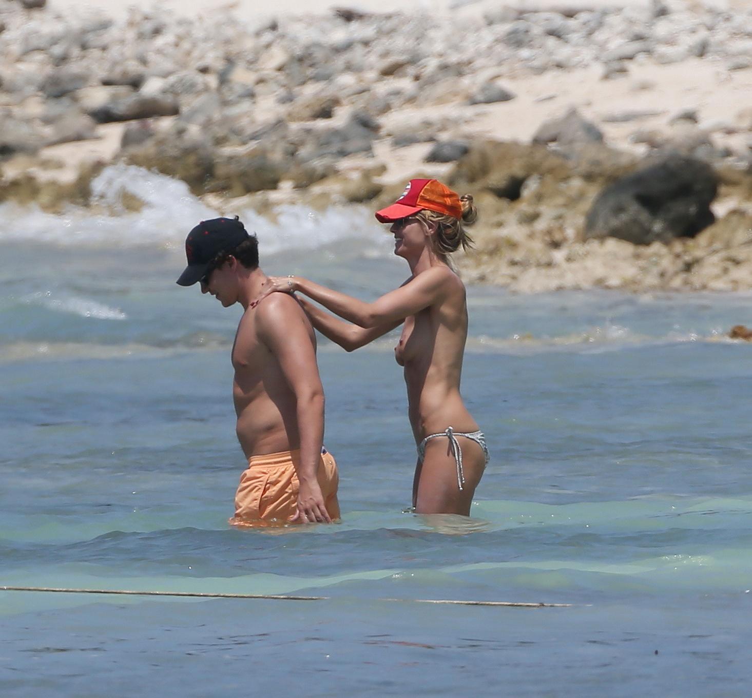 16P Heidi Klum teasing topless with her BF at the beach in Mexico