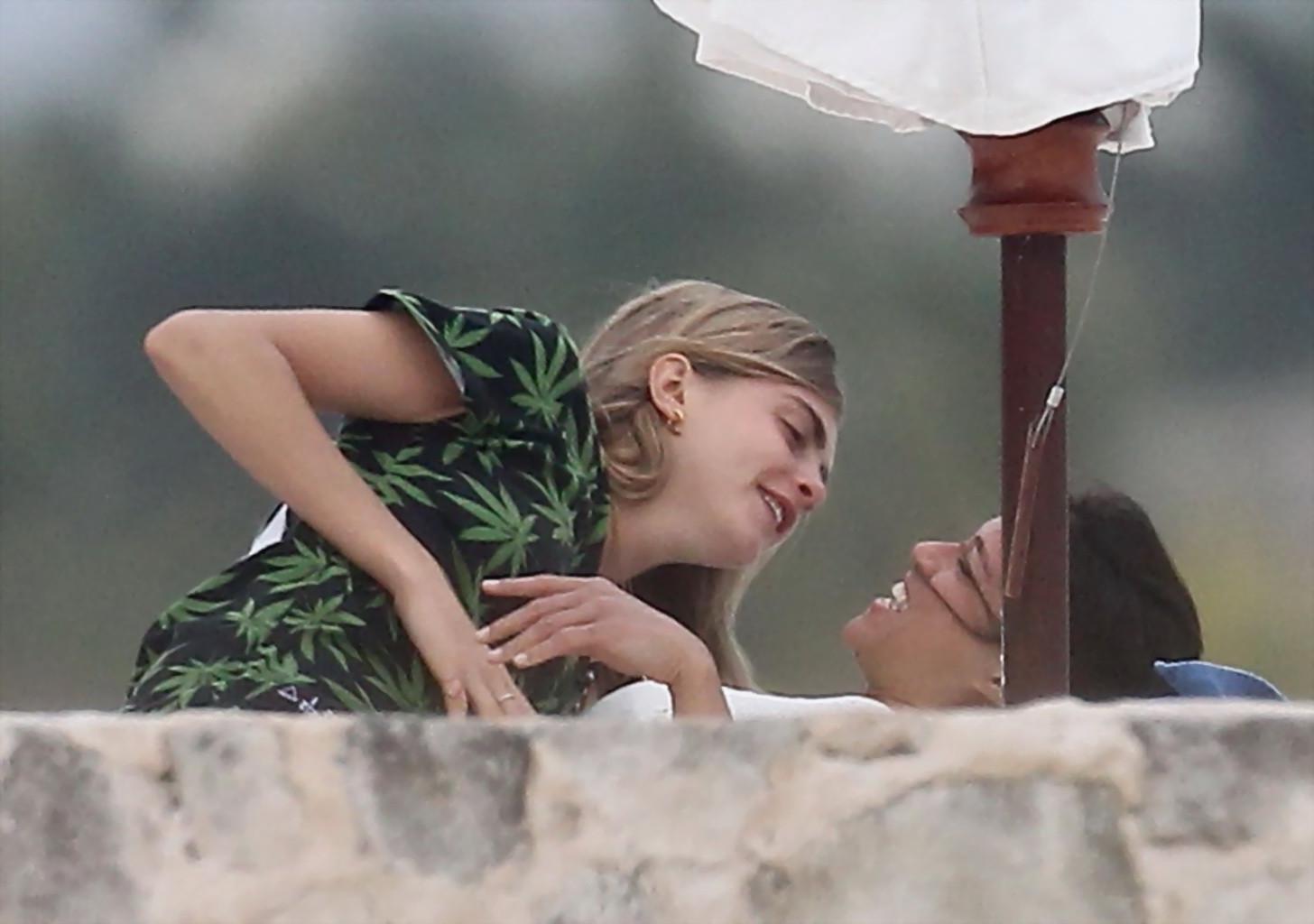 16P Michelle Rodriguez and Cara Delevingne cuddling and groping on the beach