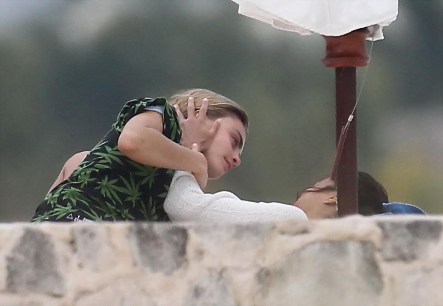16P Michelle Rodriguez and Cara Delevingne cuddling and groping on the beach