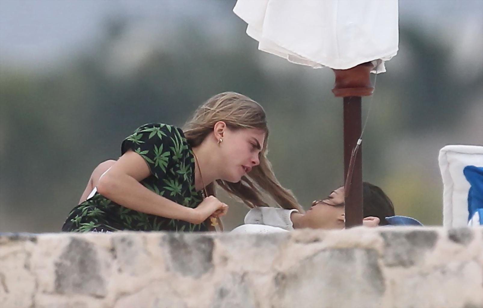 16P Michelle Rodriguez and Cara Delevingne cuddling and groping on the beach