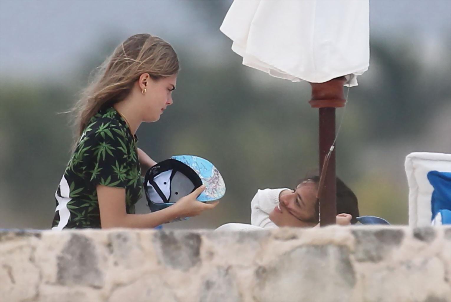 16P Michelle Rodriguez and Cara Delevingne cuddling and groping on the beach