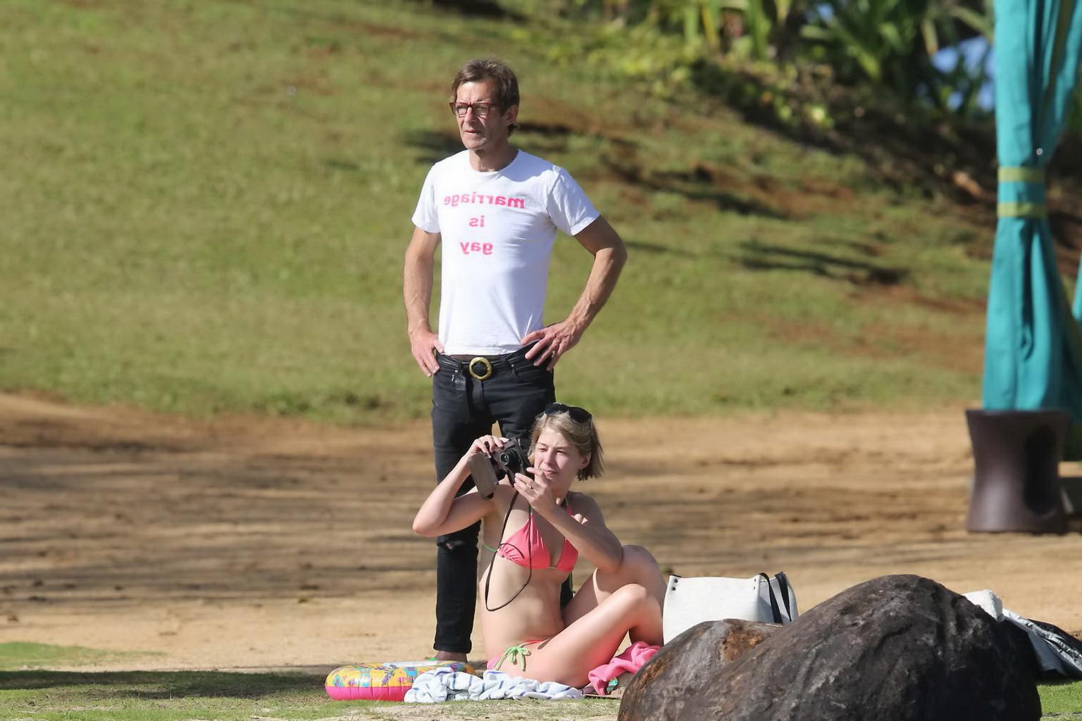 16P Rosamund Pike wearing tiny pink bikini at the beach in Hawaii