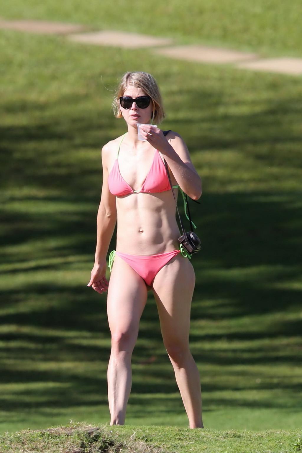 16P Rosamund Pike wearing tiny pink bikini at the beach in Hawaii