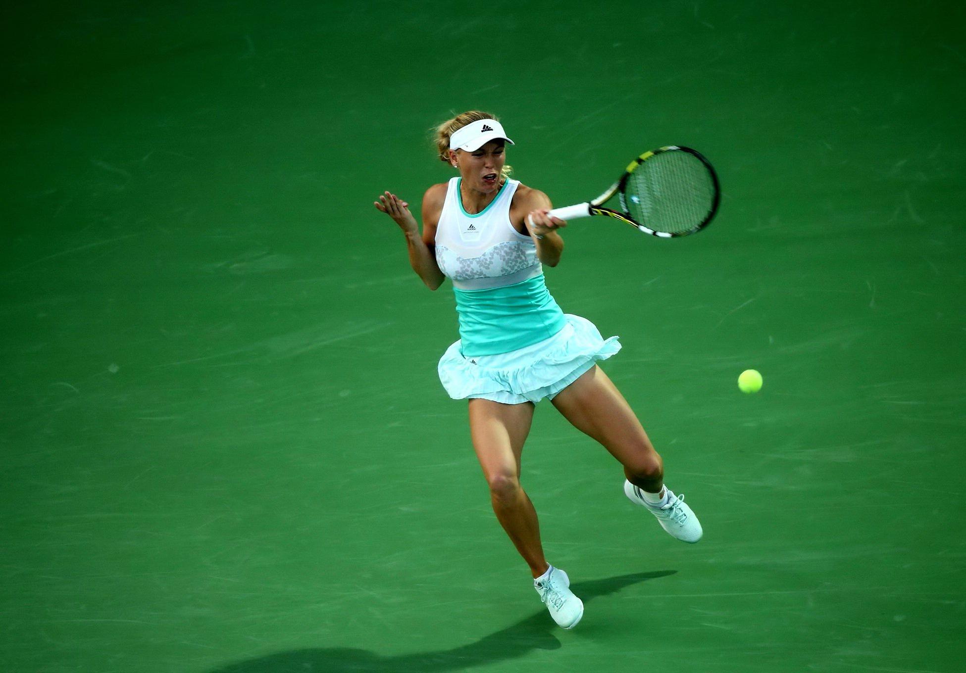 16P Caroline Wozniacki flashing her white panties at the WTA Dubai Duty Free Tennis 