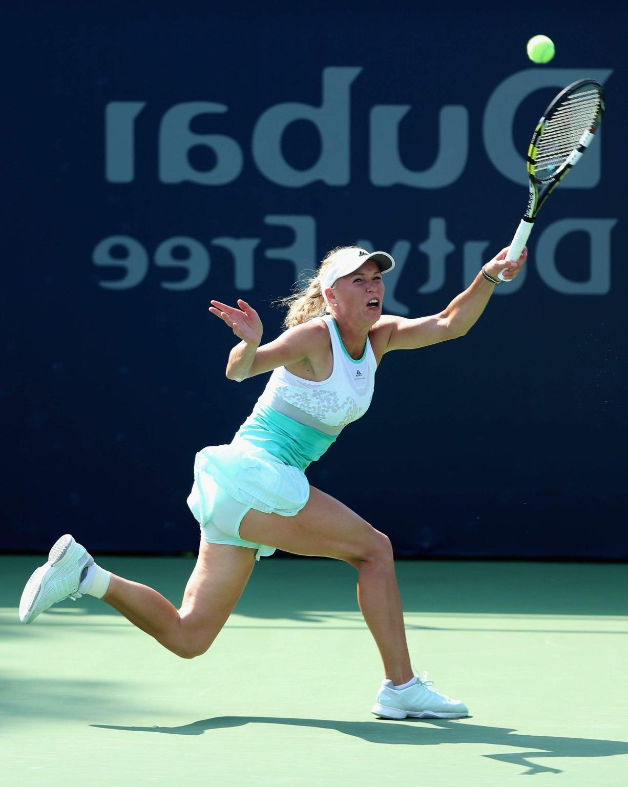 16P Caroline Wozniacki flashing her white panties at the WTA Dubai Duty Free Tennis 