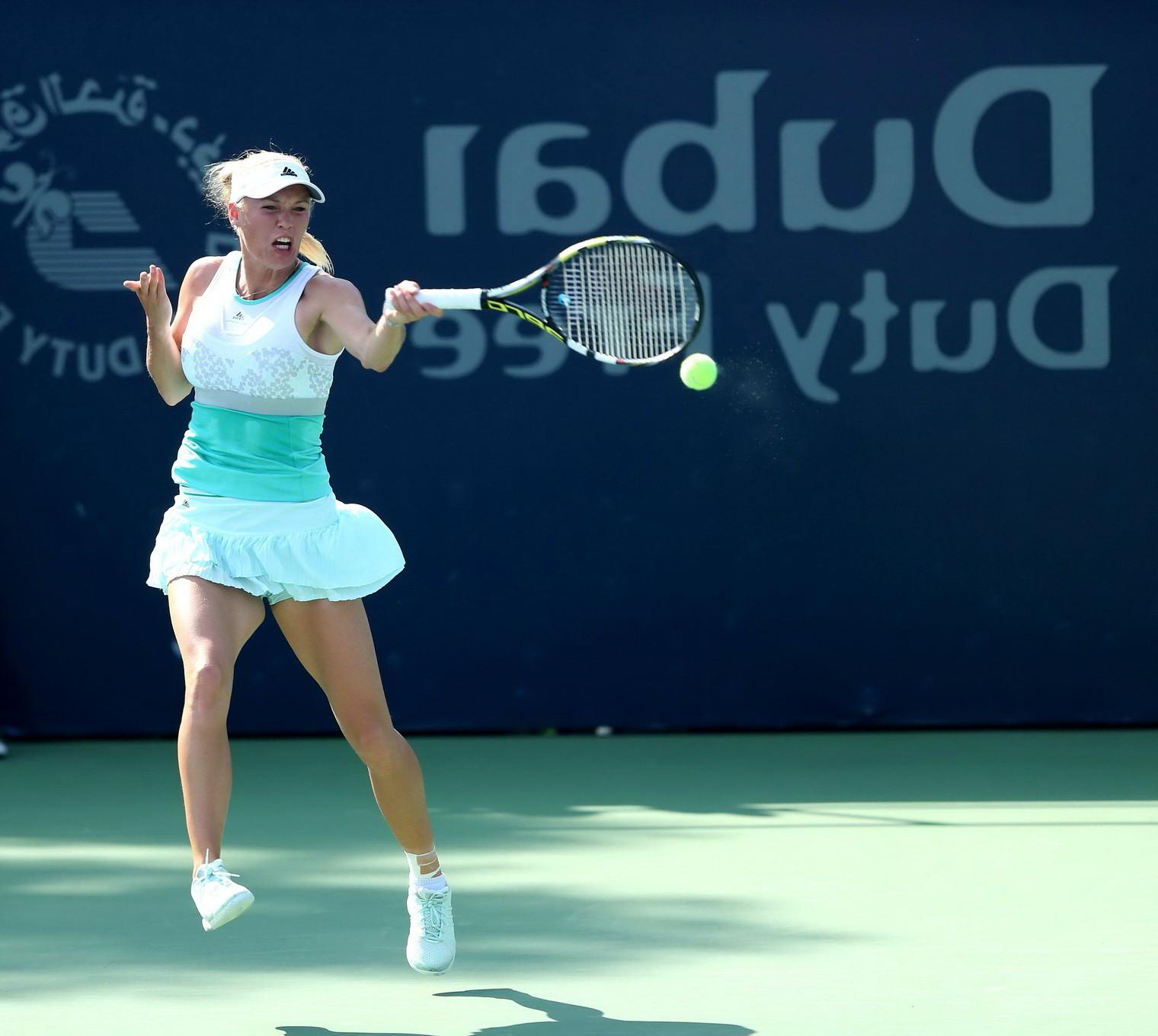 16P Caroline Wozniacki flashing her white panties at the WTA Dubai Duty Free Tennis 