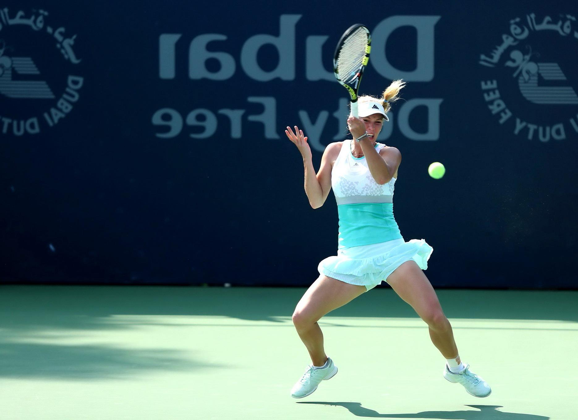 16P Caroline Wozniacki flashing her white panties at the WTA Dubai Duty Free Tennis 