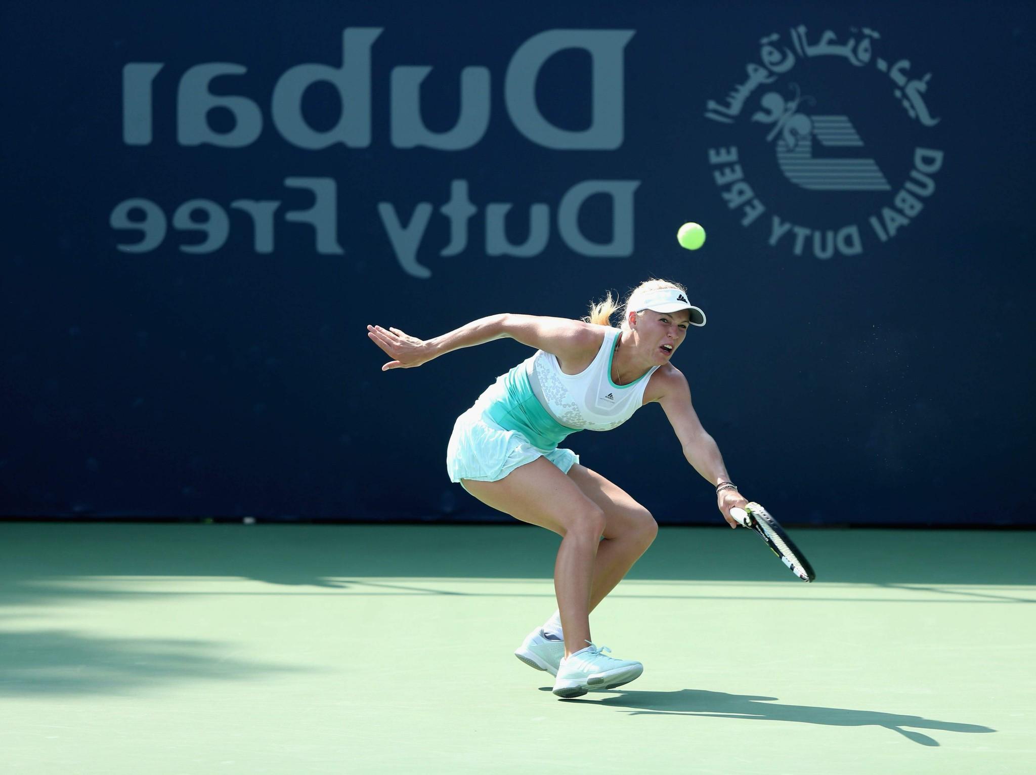 16P Caroline Wozniacki flashing her white panties at the WTA Dubai Duty Free Tennis 