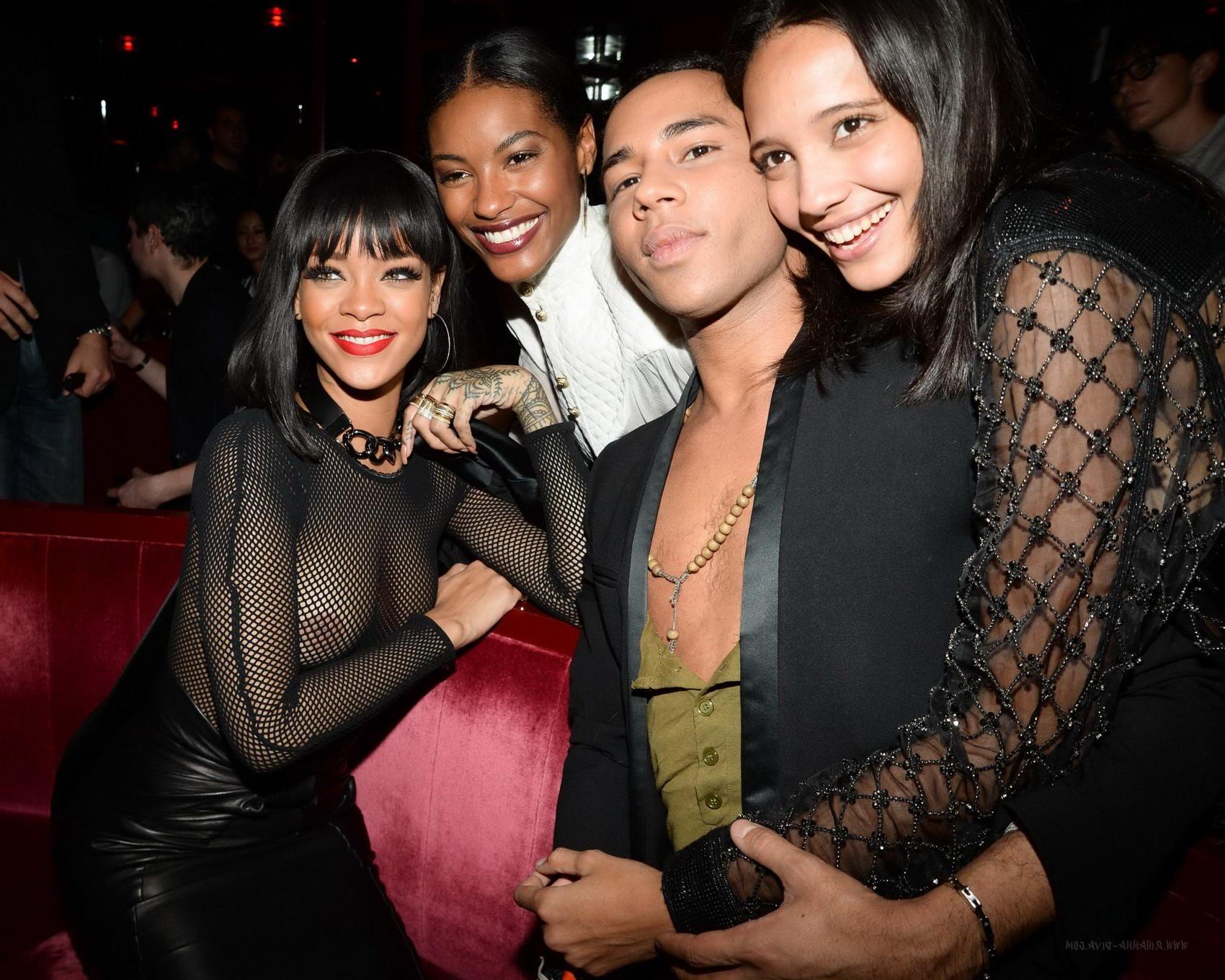 16P Rihanna braless wearing fishnet bodysuit and leather outfit at the Balmain Fashi
