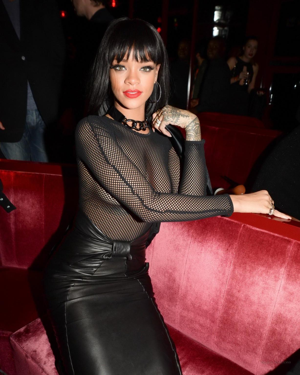 16P Rihanna braless wearing fishnet bodysuit and leather outfit at the Balmain Fashi