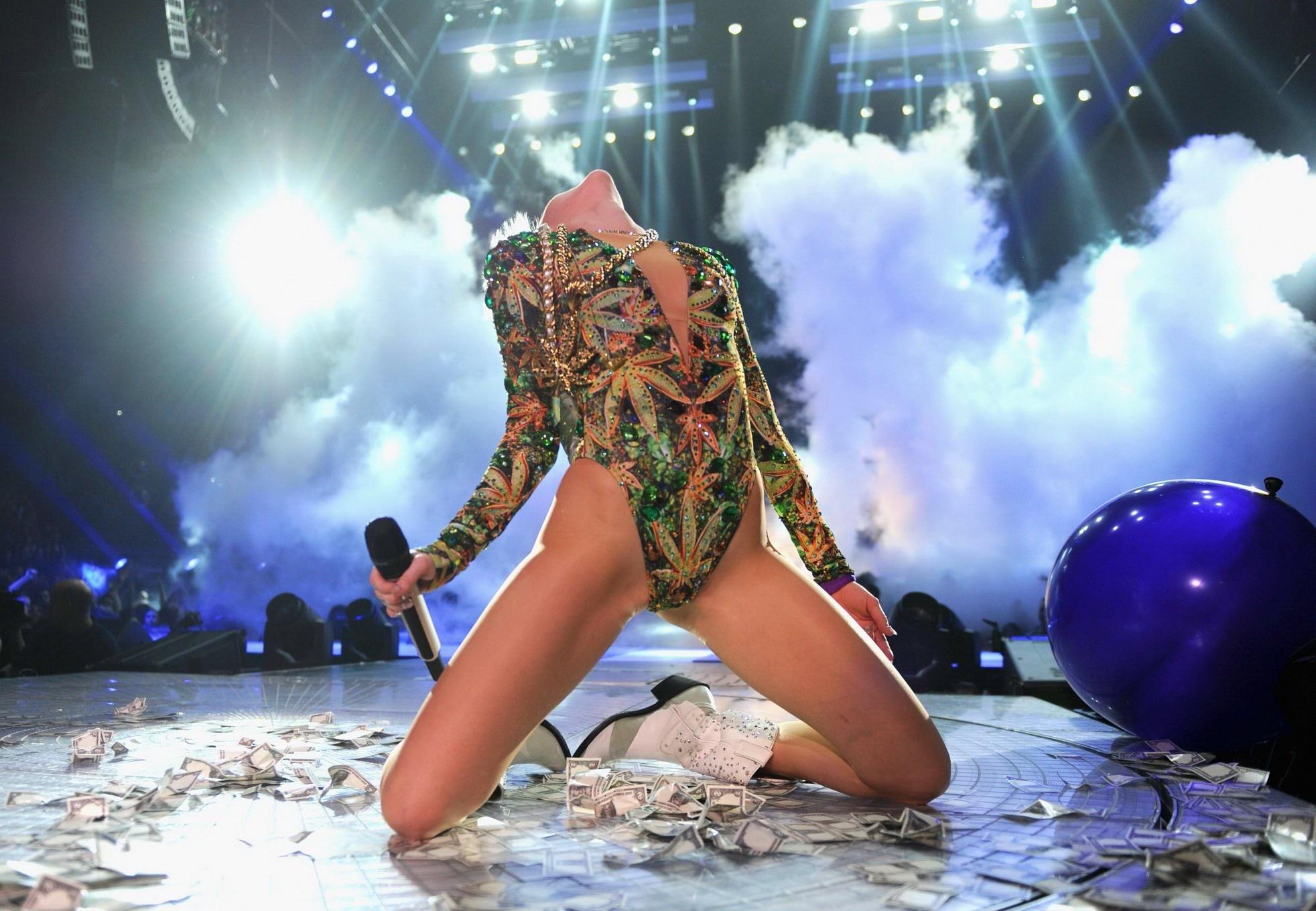 16P Miley Cyrus naughty performance in marijuana leaf print bodysuit during the Bang
