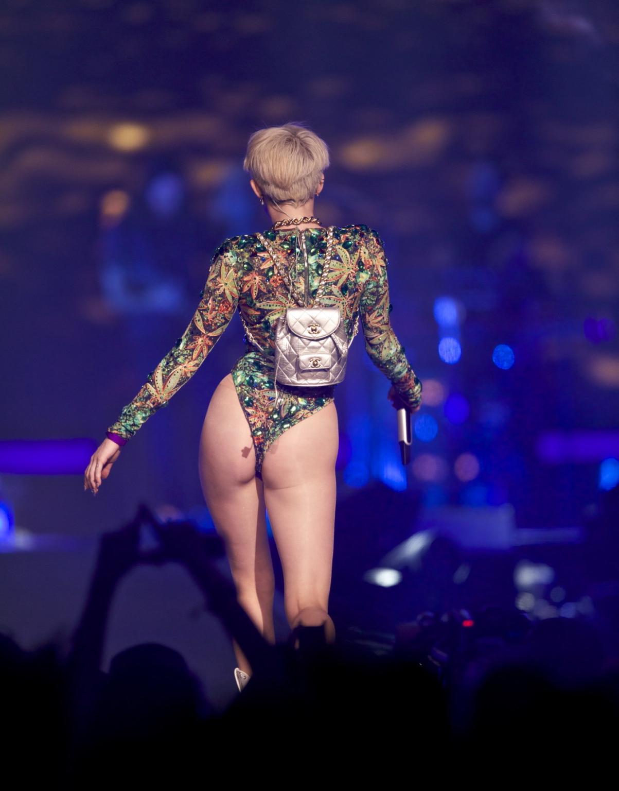 16P Miley Cyrus naughty performance in marijuana leaf print bodysuit during the Bang