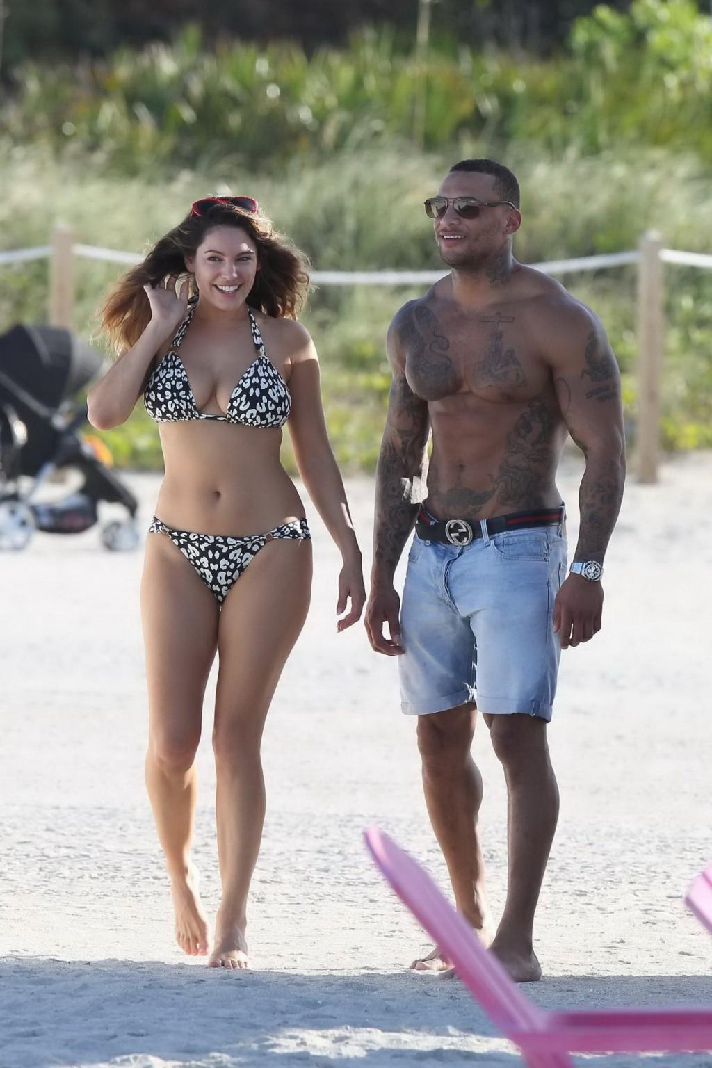 16P Kelly Brook showing off her curvy bikini body at the beach in Miami