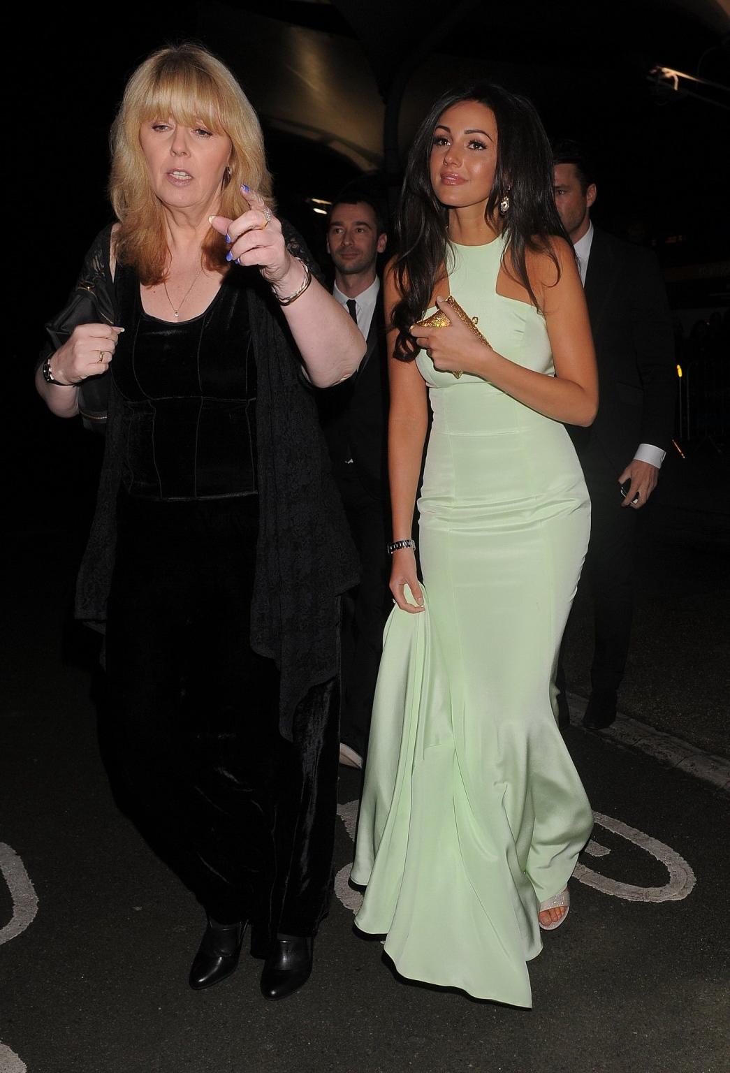 16P Michelle Keegan looking hot in a gorgeous white maxi dress at National Televisio