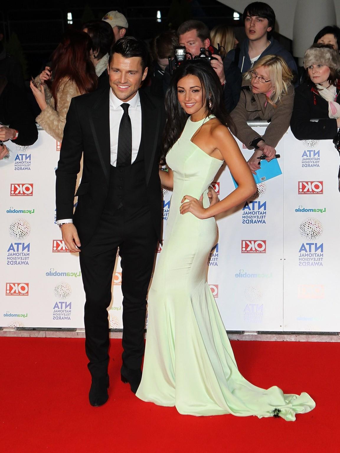 16P Michelle Keegan looking hot in a gorgeous white maxi dress at National Televisio