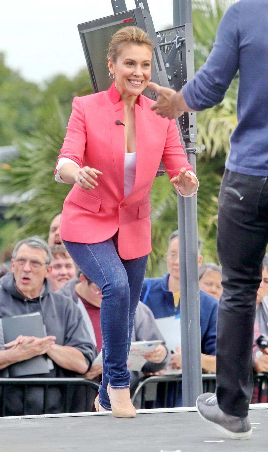 16P Alyssa Milano showing huge cleavage on the set of 'Extra' at The Grove in LA
