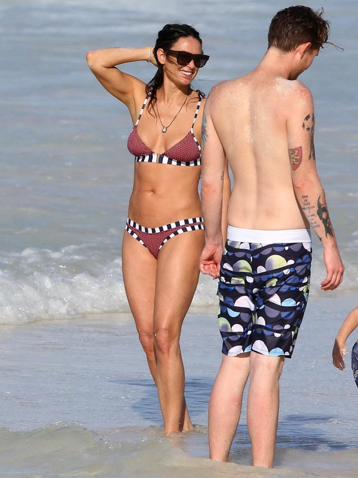 16P Demi Moore showing off her bikini body on a beach in Mexico