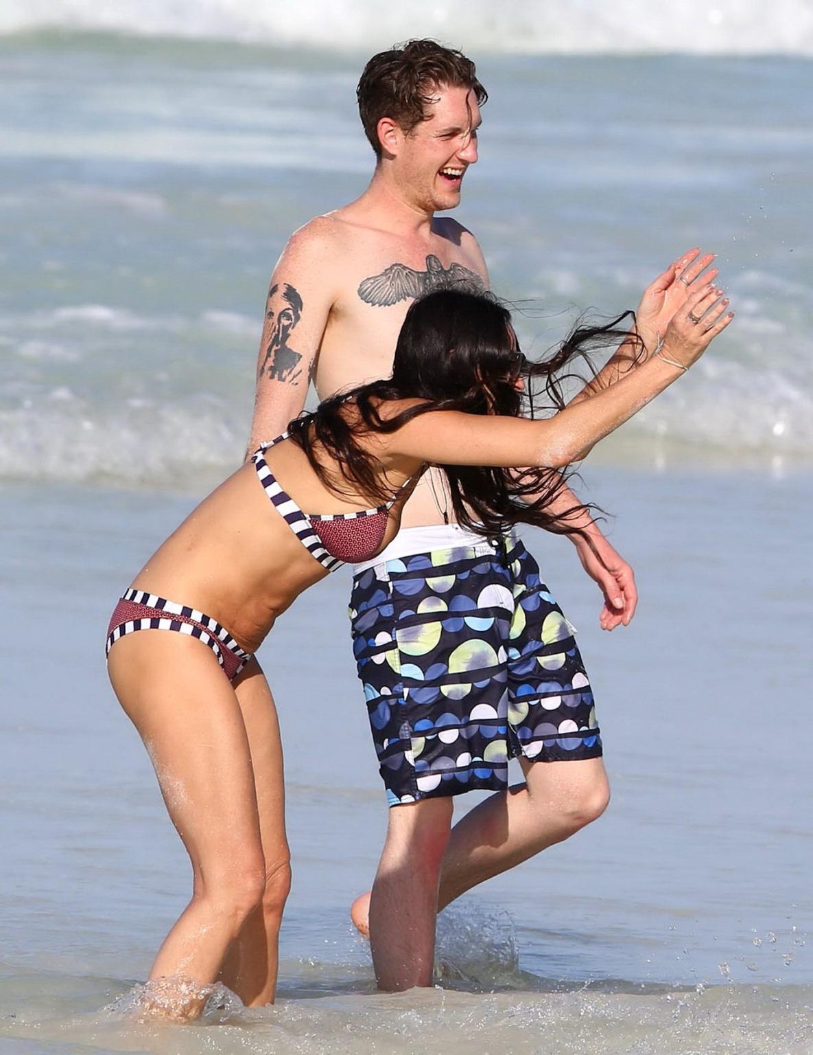 16P Demi Moore showing off her bikini body on a beach in Mexico