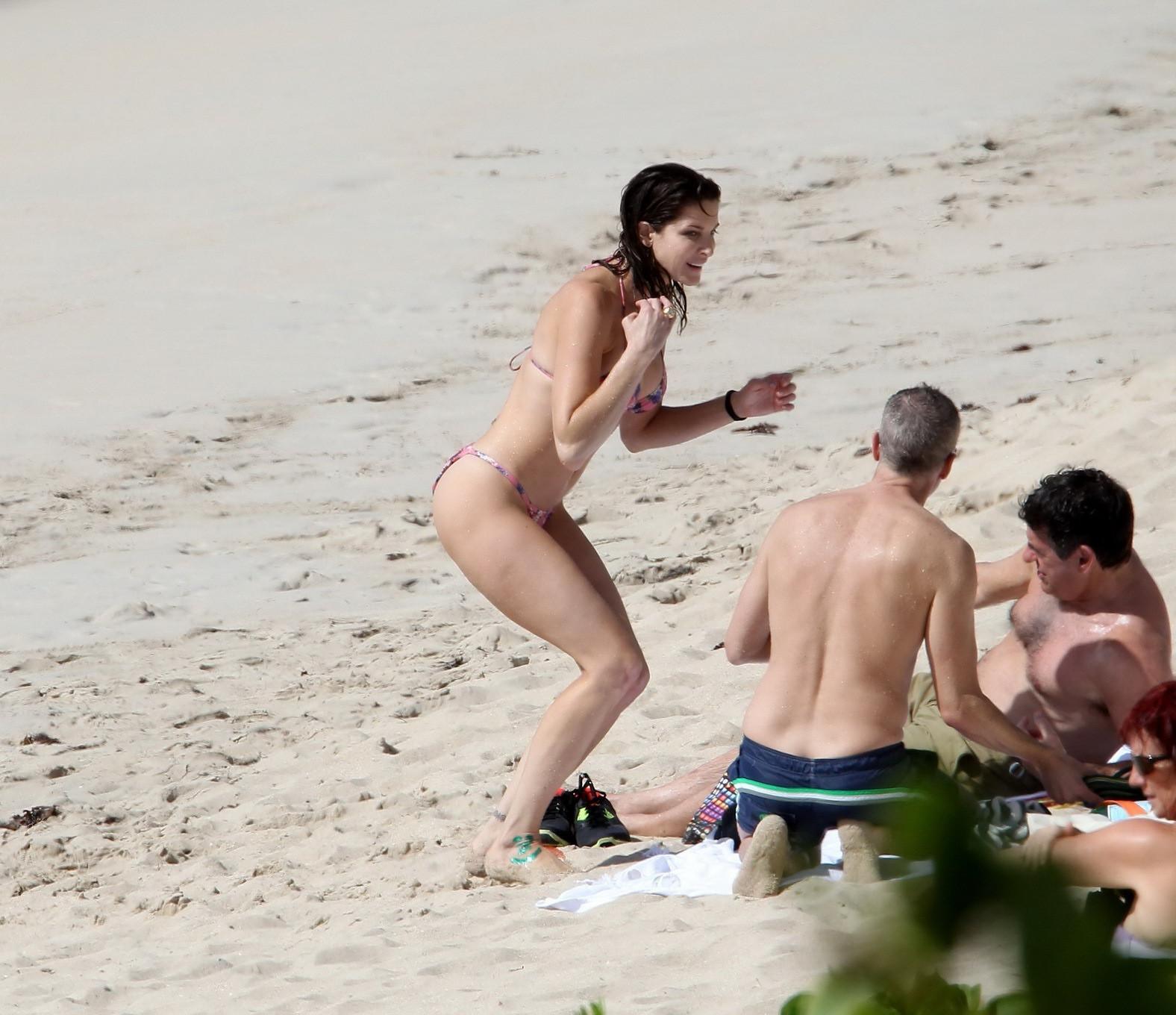 16P Stephanie Seymour wearing skimpy floral bikini at the beach in St.Barts