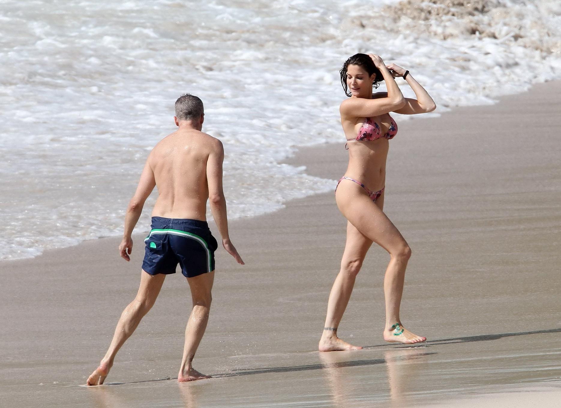 16P Stephanie Seymour wearing skimpy floral bikini at the beach in St.Barts