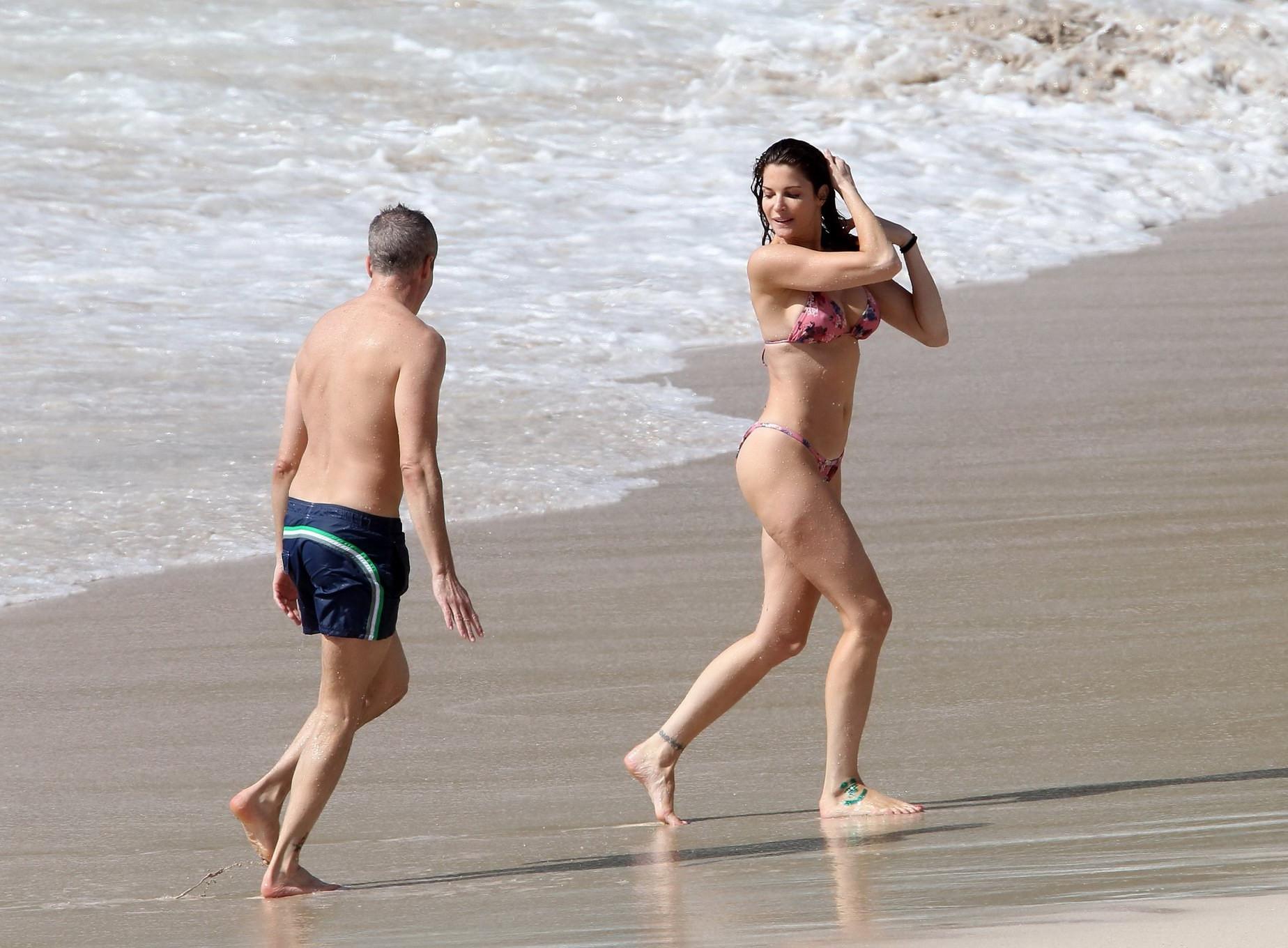 16P Stephanie Seymour wearing skimpy floral bikini at the beach in St.Barts
