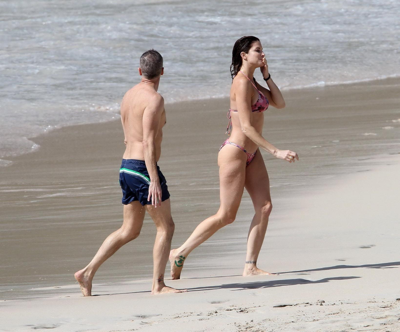 16P Stephanie Seymour wearing skimpy floral bikini at the beach in St.Barts