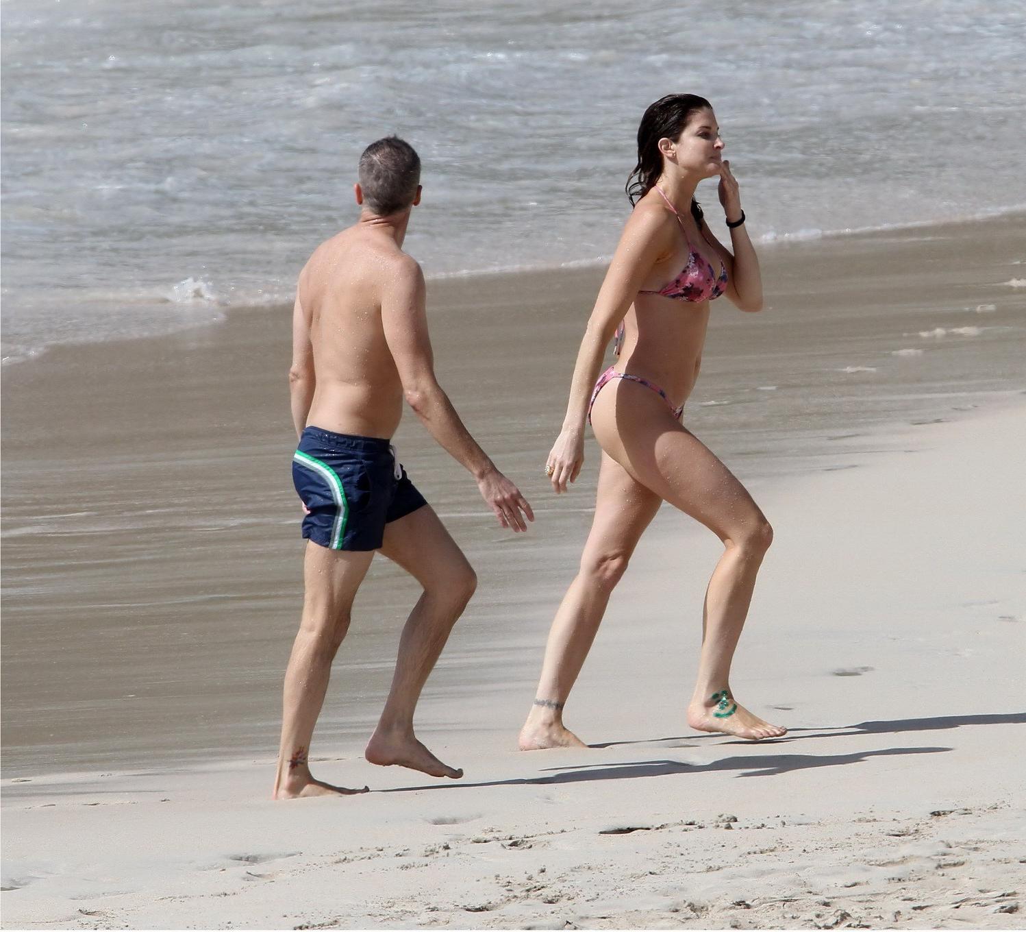 16P Stephanie Seymour wearing skimpy floral bikini at the beach in St.Barts