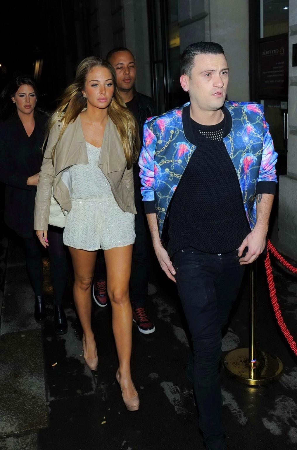 16P Tulisa Contostavlos cleavy and leggy wearing skimpy white outfit night out in Lo