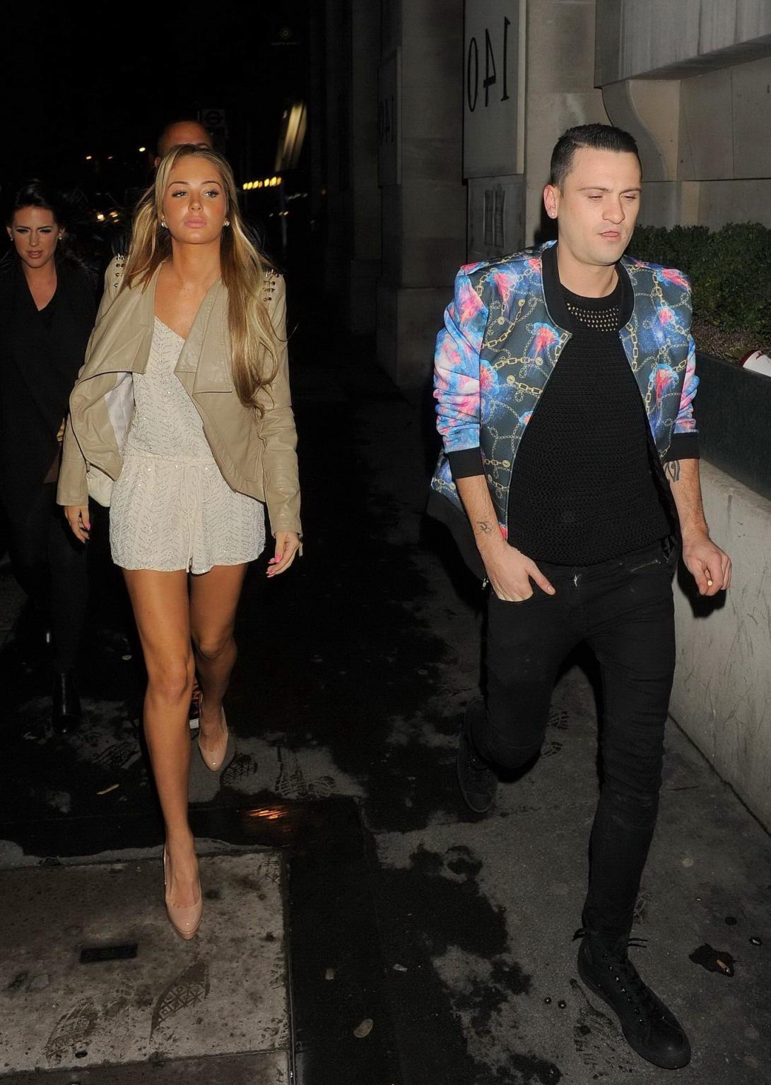 16P Tulisa Contostavlos cleavy and leggy wearing skimpy white outfit night out in Lo