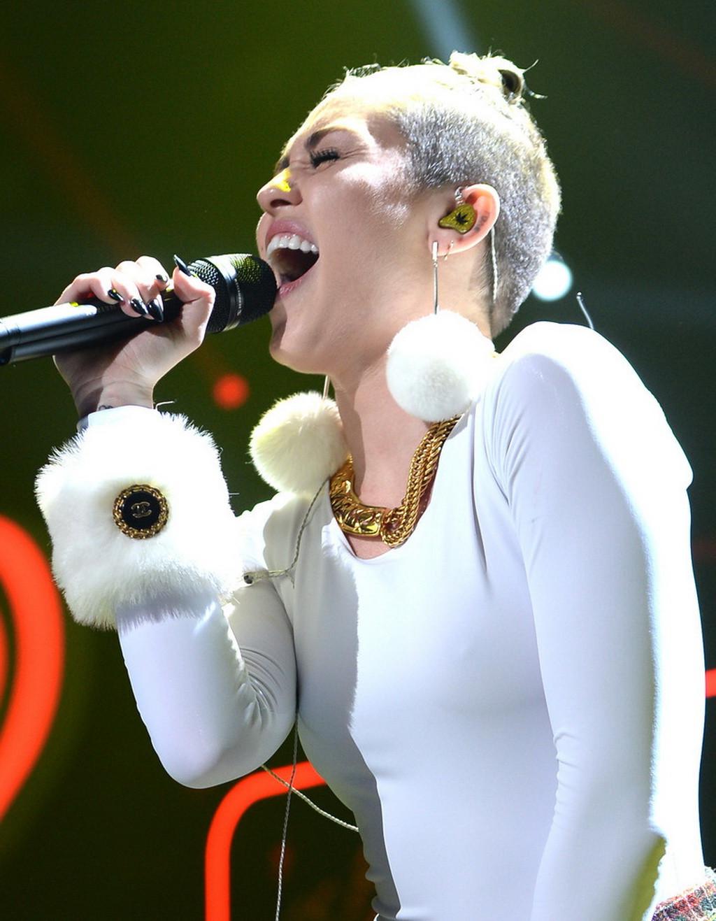 16P Miley Cyrus wearing white transparent bodysuit at Y100 Jingle Ball 2013 in Miami