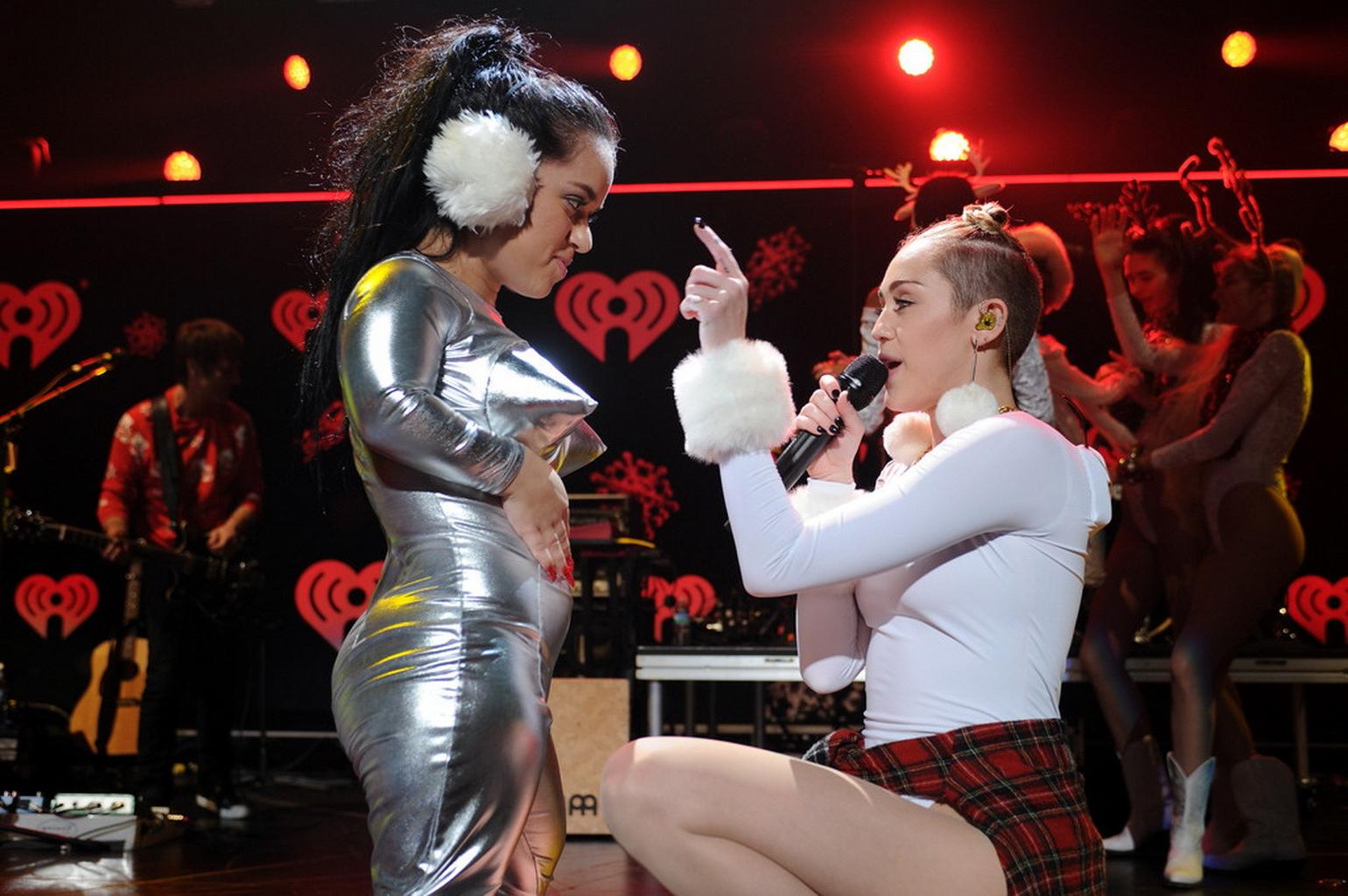 16P Miley Cyrus wearing white transparent bodysuit at Y100 Jingle Ball 2013 in Miami