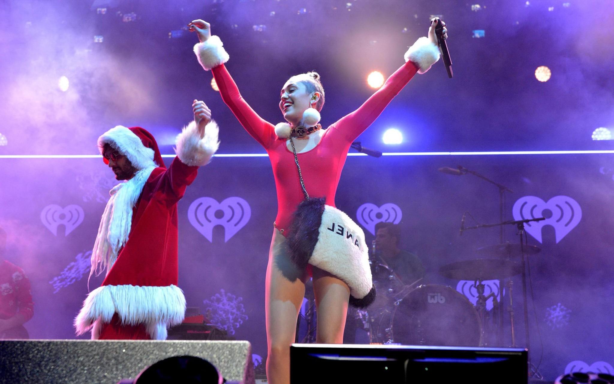 16P Miley Cyrus shows off pokies and ass wearing a red leotard on stage at 93.3 FLZ'