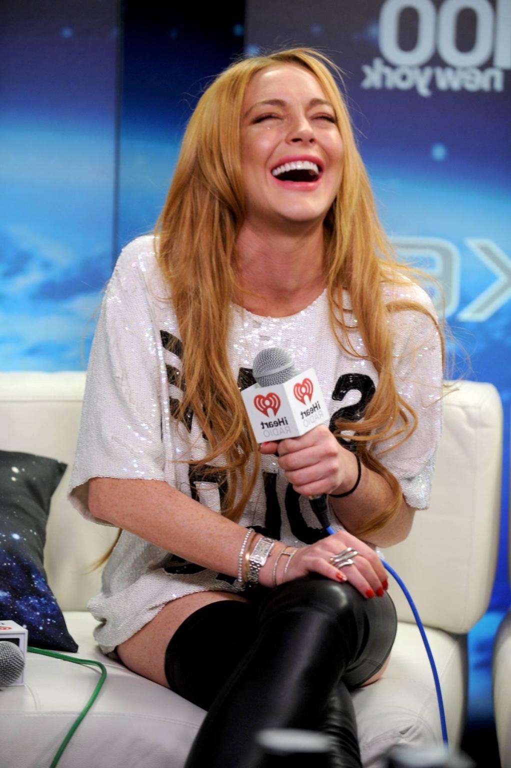 16P Lindsay Lohan wearing latex stockings at the Jingle Ball in New York City
