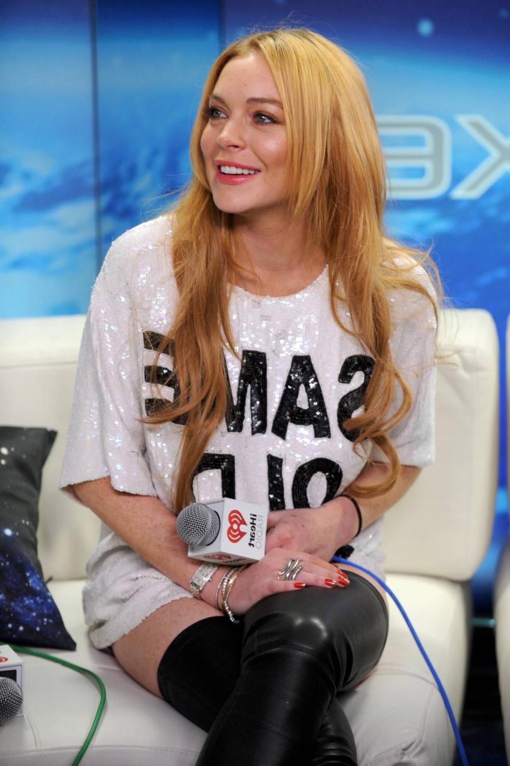 16P Lindsay Lohan wearing latex stockings at the Jingle Ball in New York City