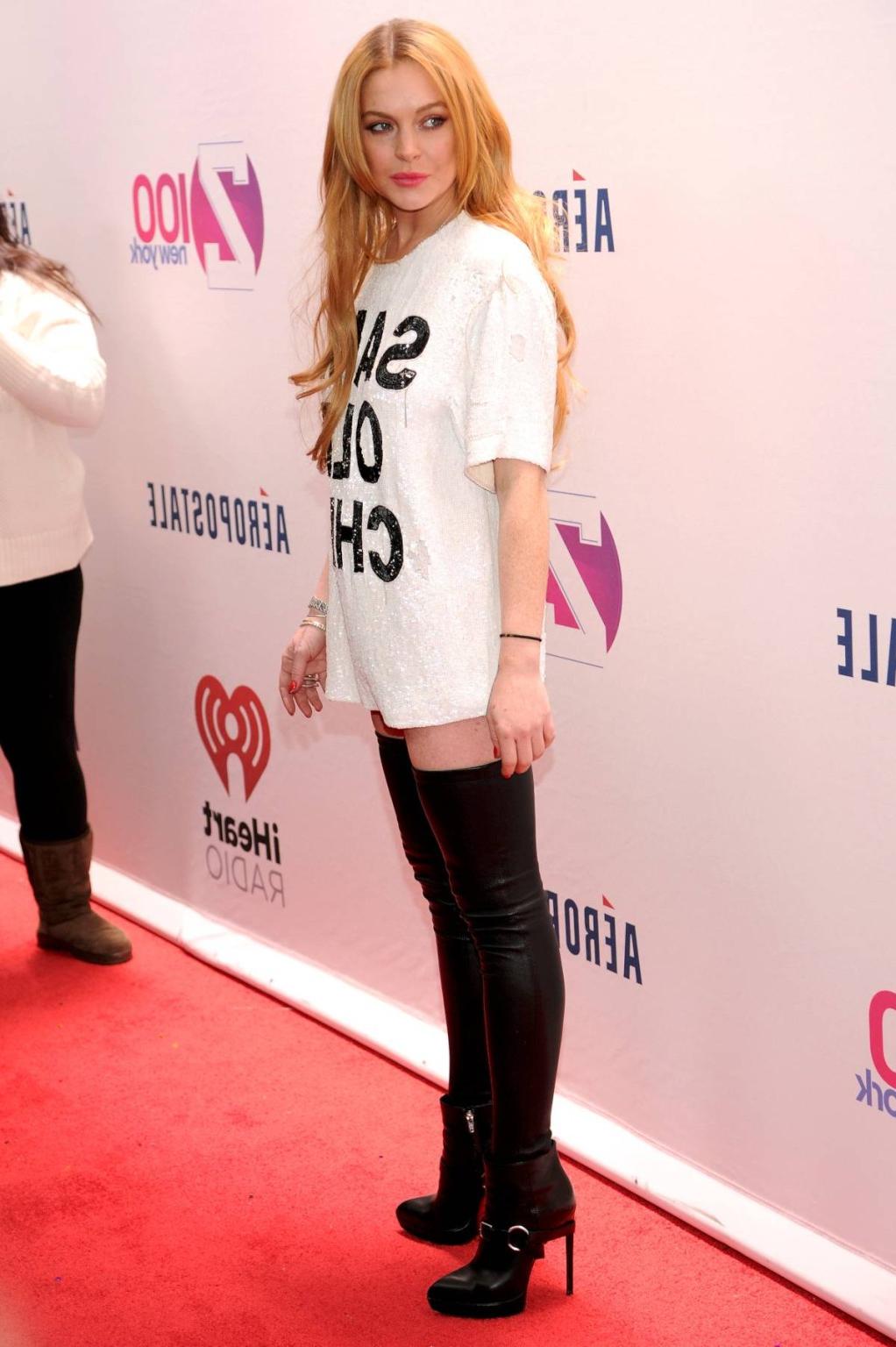 16P Lindsay Lohan wearing latex stockings at the Jingle Ball in New York City