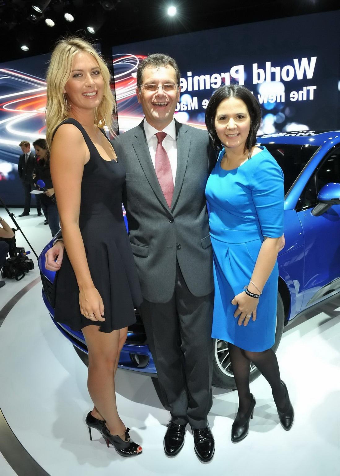 16P Maria Sharapova cleavy and leggy wearing black mini dress at Porsche Macan World