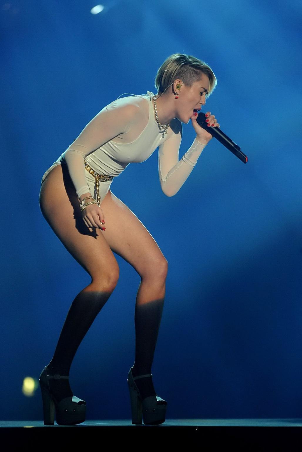 16P Miley Cyrus looking hot in white bodysuit while performs at 2013 MTV Europe Musi