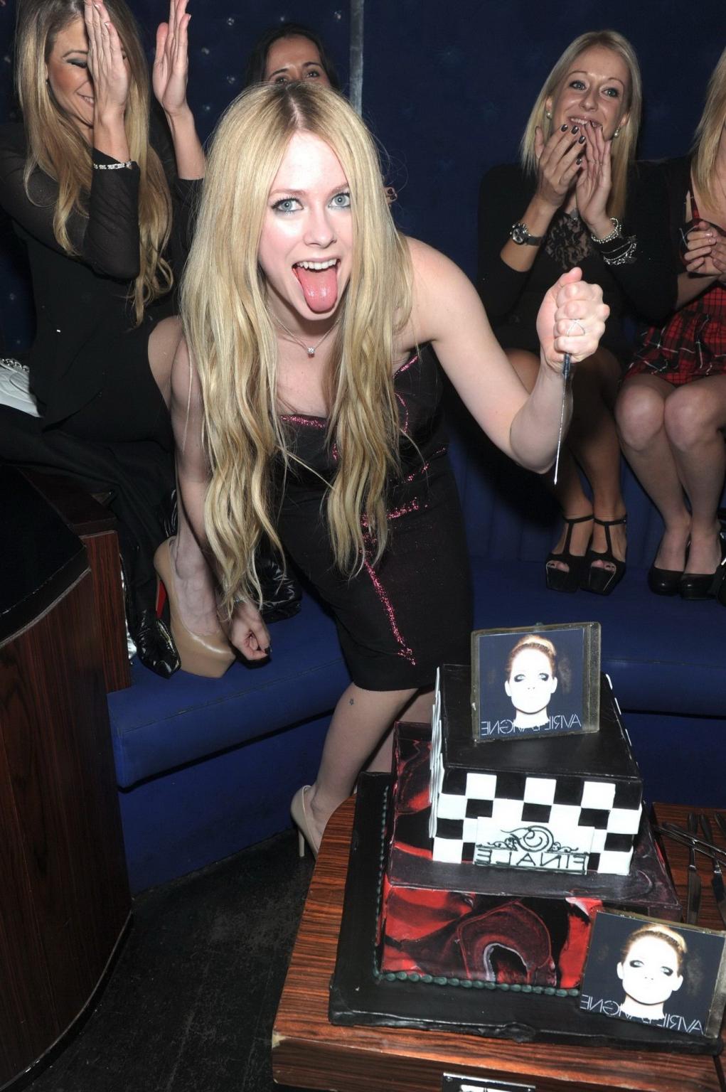 16P Avril Lavigne showing big cleavage in a tight tube dress at her new album releas