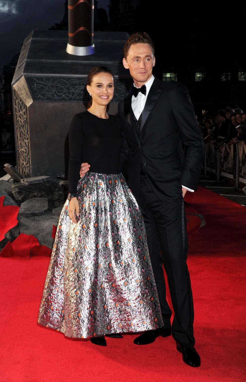 16P Natalie Portman flashing her big assets in a simple slightly transparent dress a