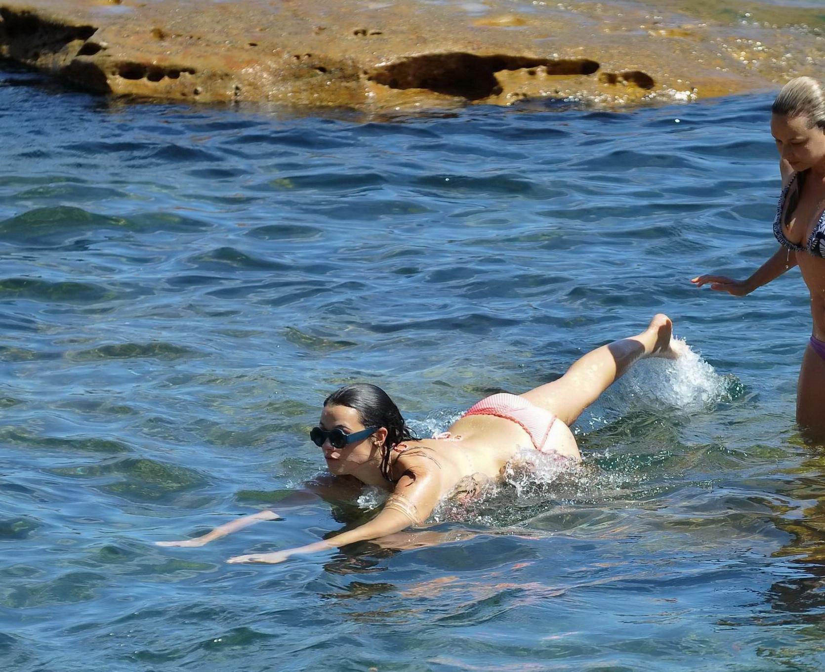 16P Demi Harman showing off her curvy body in a striped red bikini at the beach in S