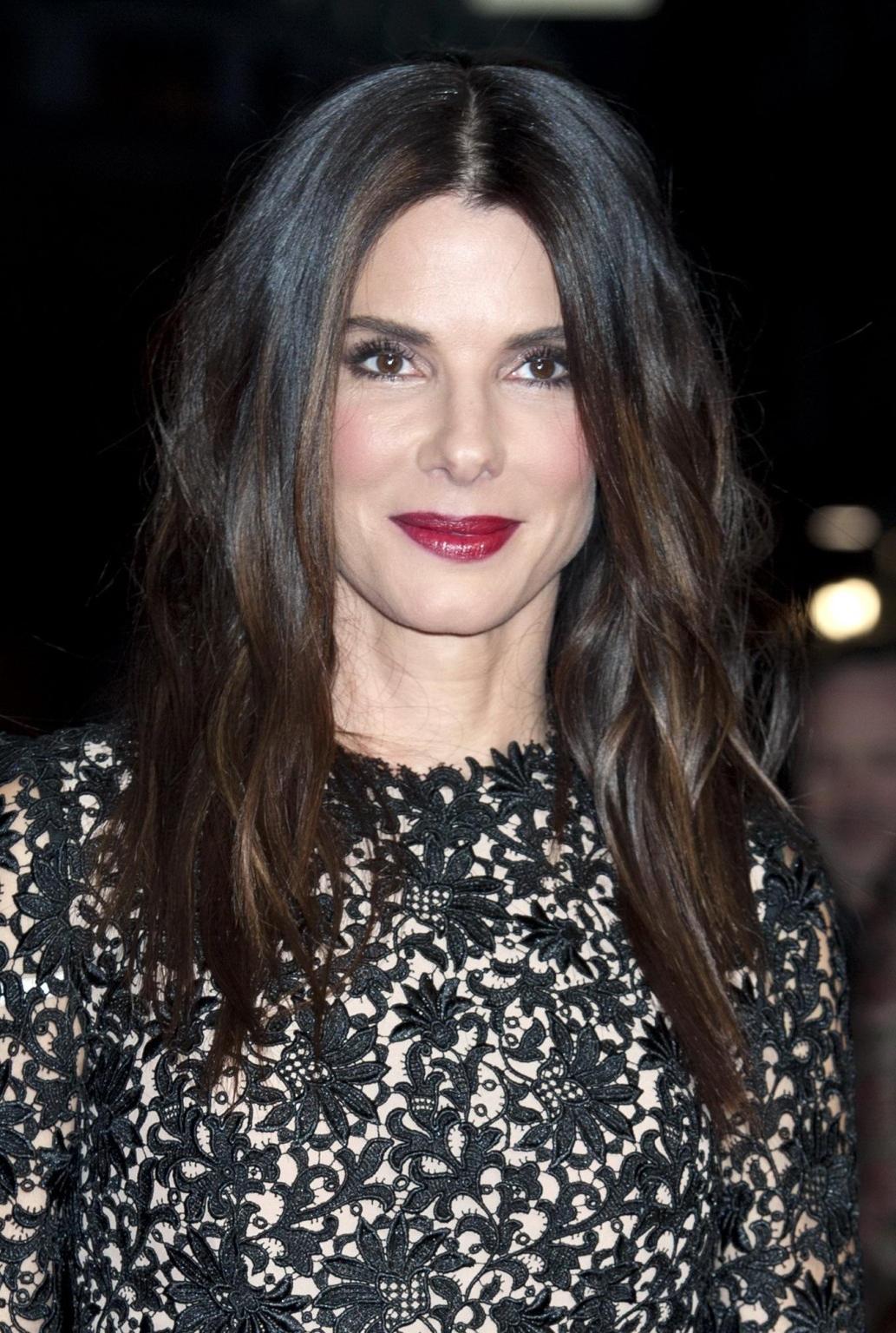 16P Sandra Bullock wearing a black lace mini dress at the 'Gravity' screening in Lon