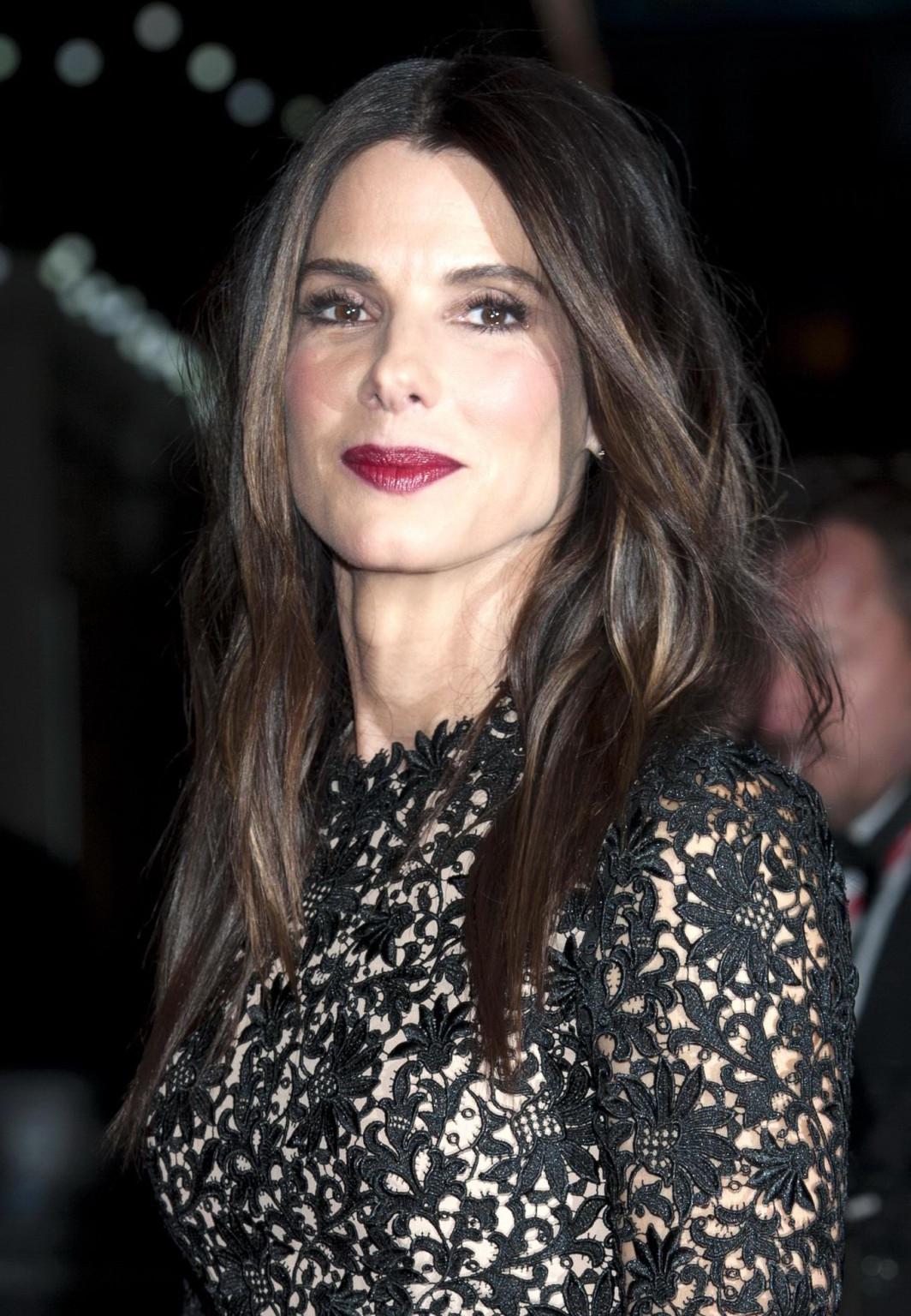 16P Sandra Bullock wearing a black lace mini dress at the 'Gravity' screening in Lon