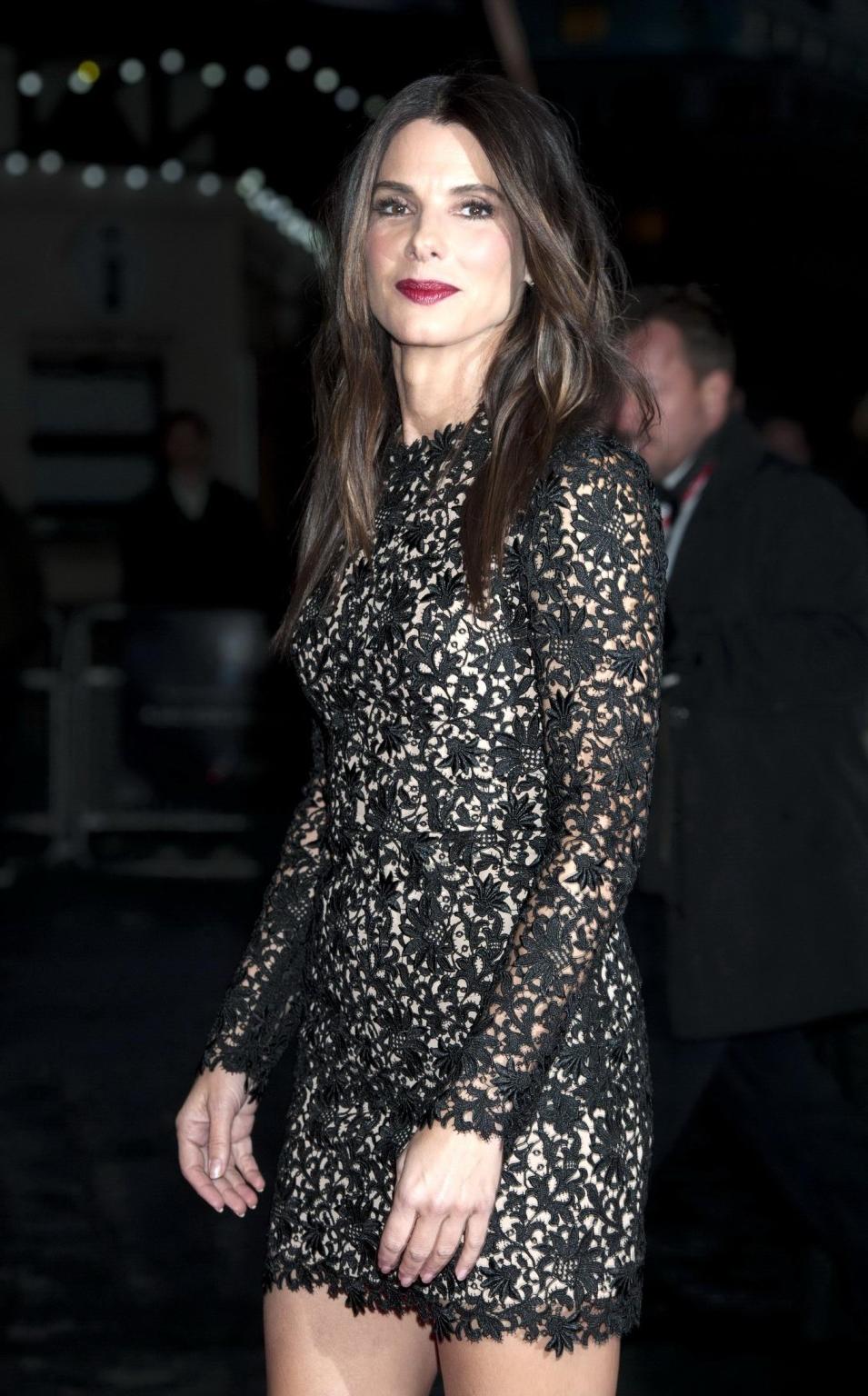 16P Sandra Bullock wearing a black lace mini dress at the 'Gravity' screening in Lon